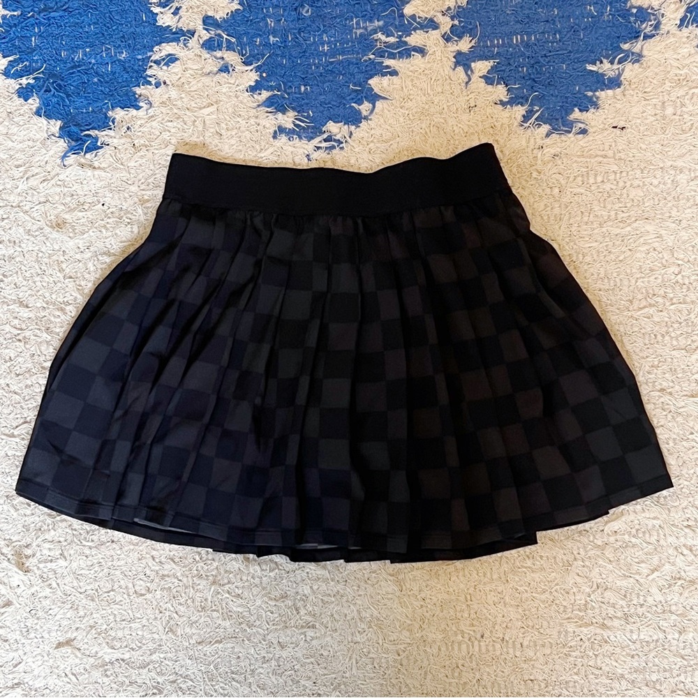 Women’s black checked tennis skirt / shorts attached